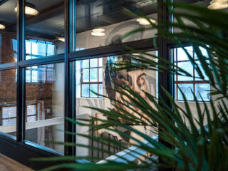 Professional and stylish shared workspace environment at Colony Flint Glass Works in Manchester. Colony Flint Glass Works Manchester Coworking Space