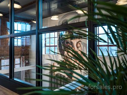Modern interior of Colony Flint Glass Works Manchester coworking space