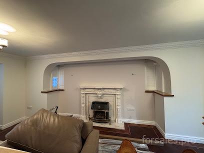 Professional painters in Manchester executing a high-quality painting project.